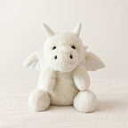 Dragon moelleux en peluche 30 cm blanc sur fond crème, en studio