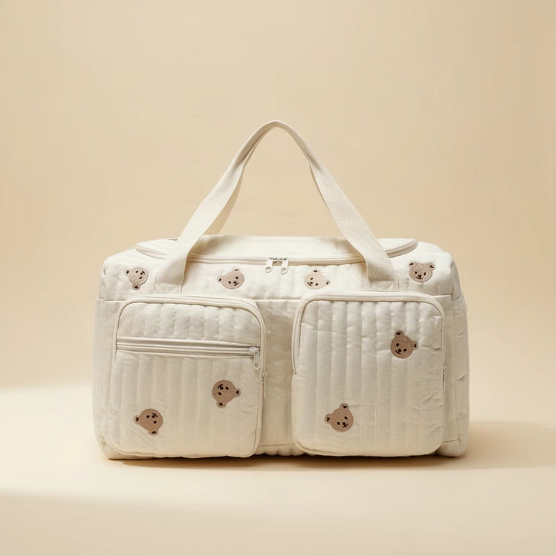 Grand sac à langer matelassé à motifs sur fond clair