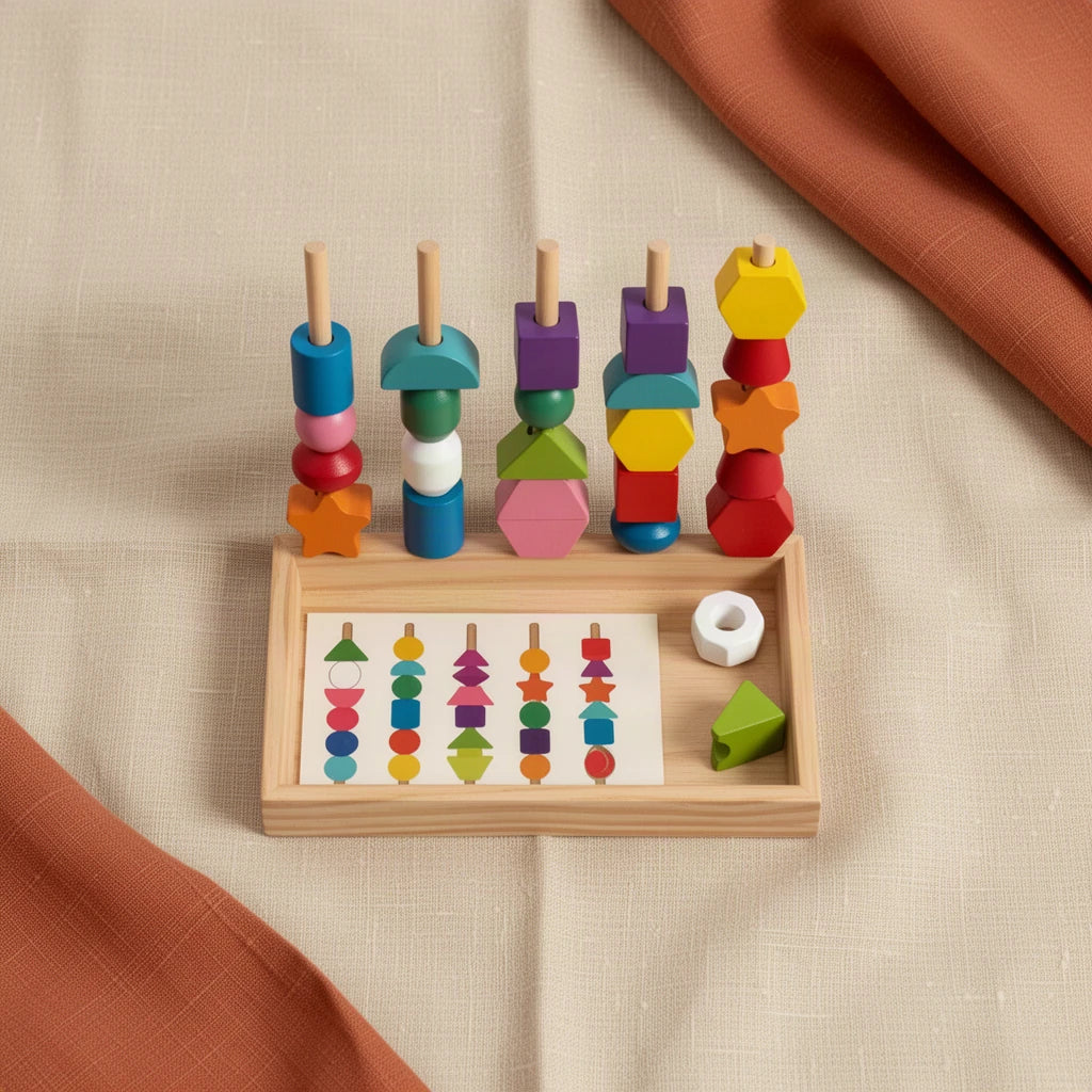 Jeu de Perles à Empiler Montessori dès 2 ans vu de dessus, posé sur du lin