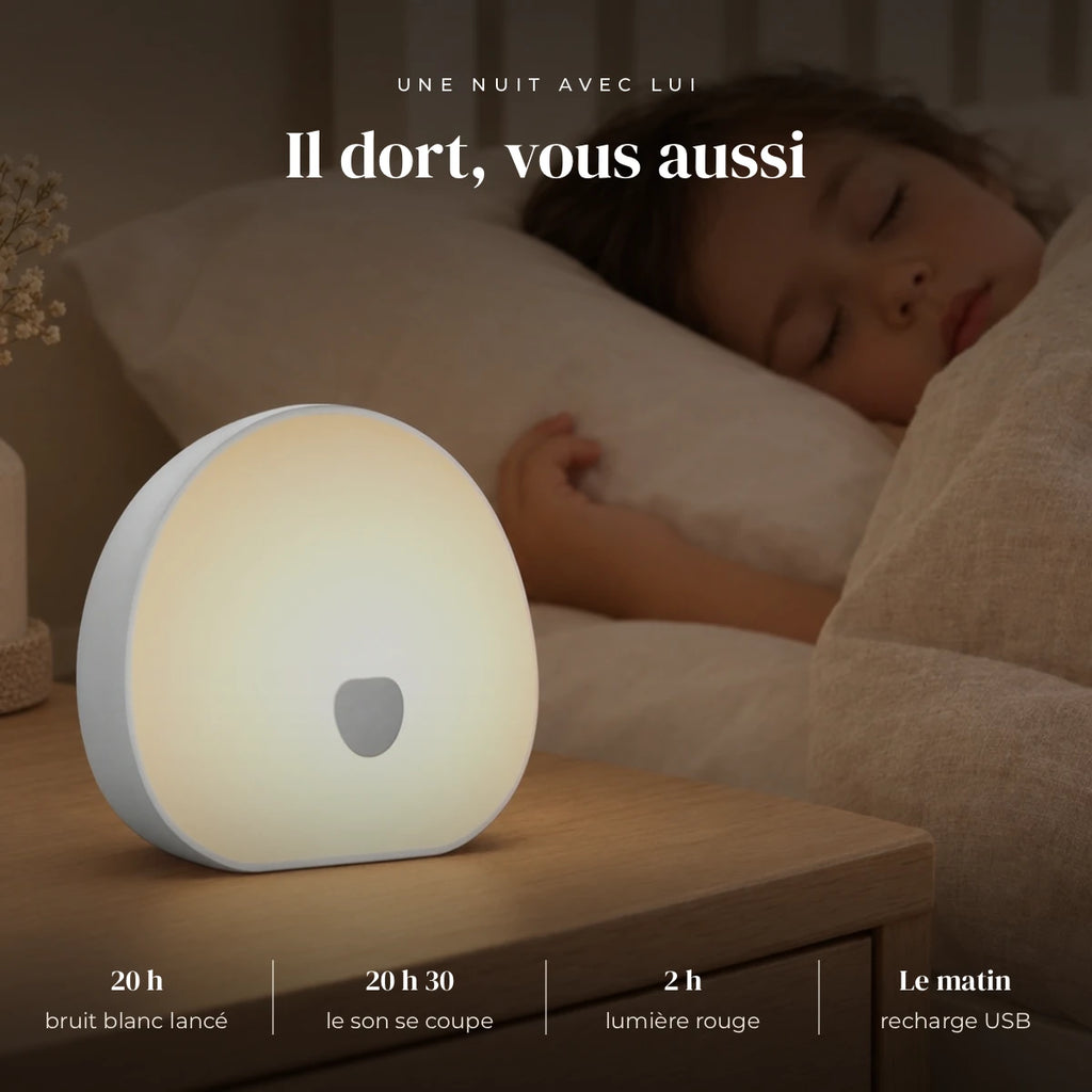 Machine à bruit blanc bébé rechargeable avec veilleuse qui éclaire doucement la chambre pendant que l’enfant dort