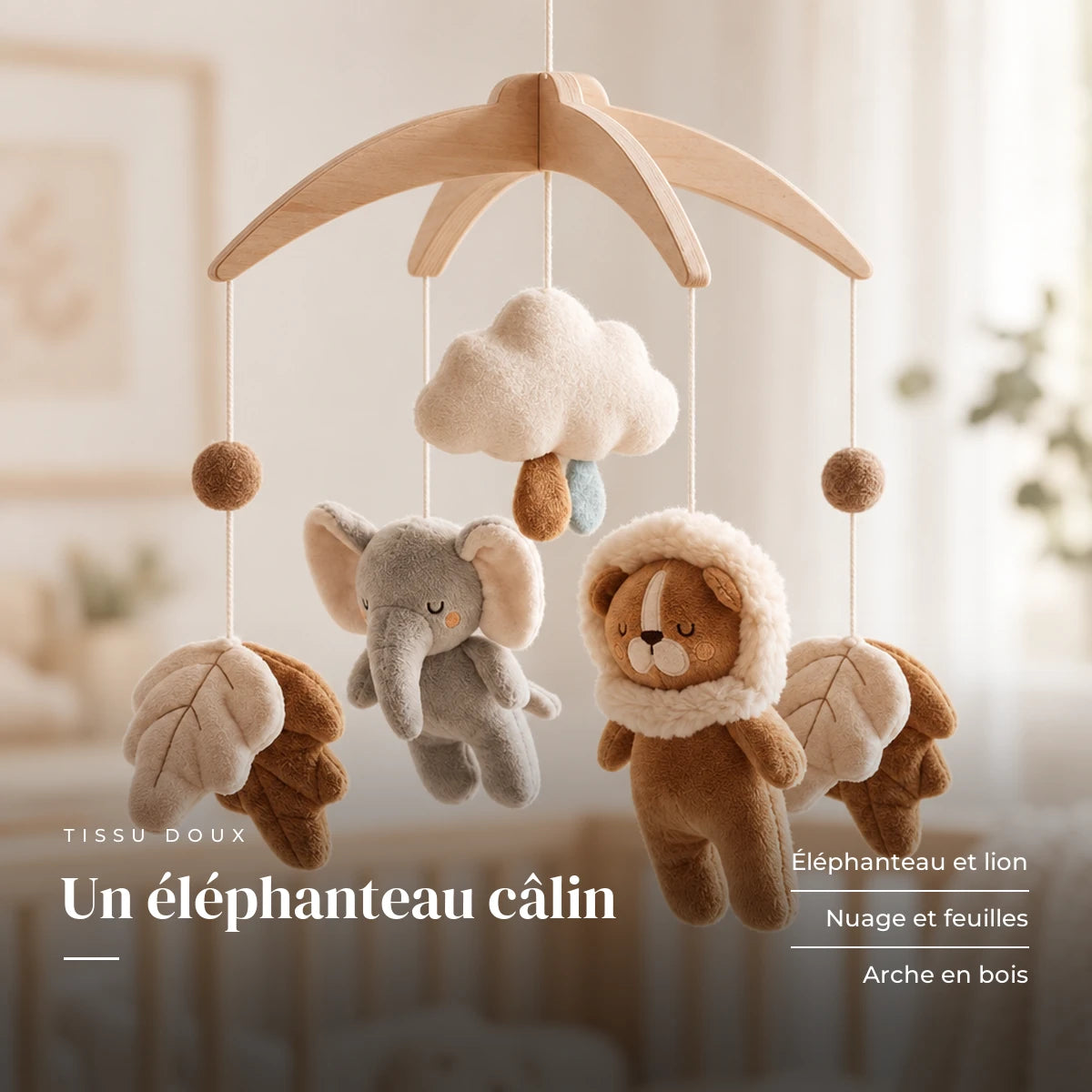 Détail des suspensions du mobile bébé Éléphanteau en bois. Un éléphanteau câlin : éléphanteau et lion, nuage et feuilles, arche en bois