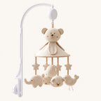 Mobile Musical Nounours avec Bras sur fond clair, vue d’ensemble des suspensions