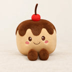 Peluche kawaii gâteau gourmand modèle chocolat sur fond crème, en studio