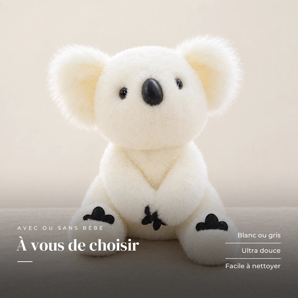 Peluche koala avec son bébé blanche sur fond crème, en studio. À vous de choisir : blanc ou gris, ultra douce, facile à nettoyer
