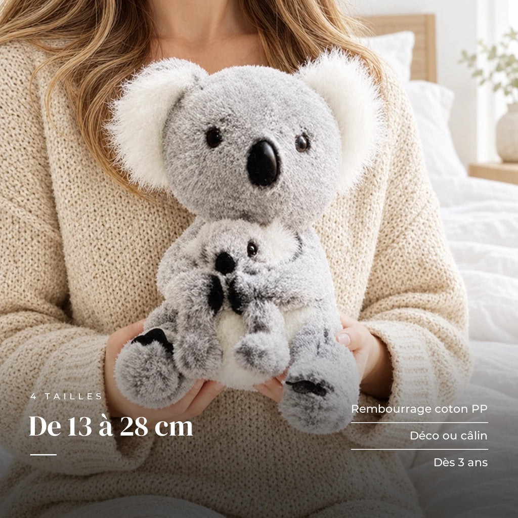 Peluche koala avec son bébé dans les bras d’un adulte. De 13 à 28 cm : rembourrage coton PP, déco ou câlin, dès 3 ans