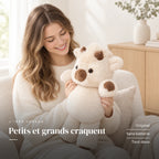 Peluche vache originale qui court dans les bras d’un adulte. Petits et grands craquent : original, sans batterie, tout doux
