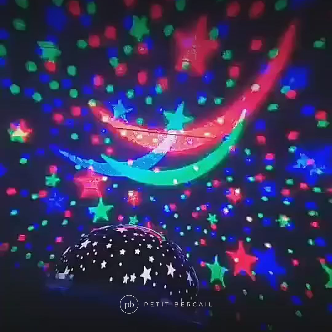Veilleuse étoile en action : projection de la lune et des étoiles