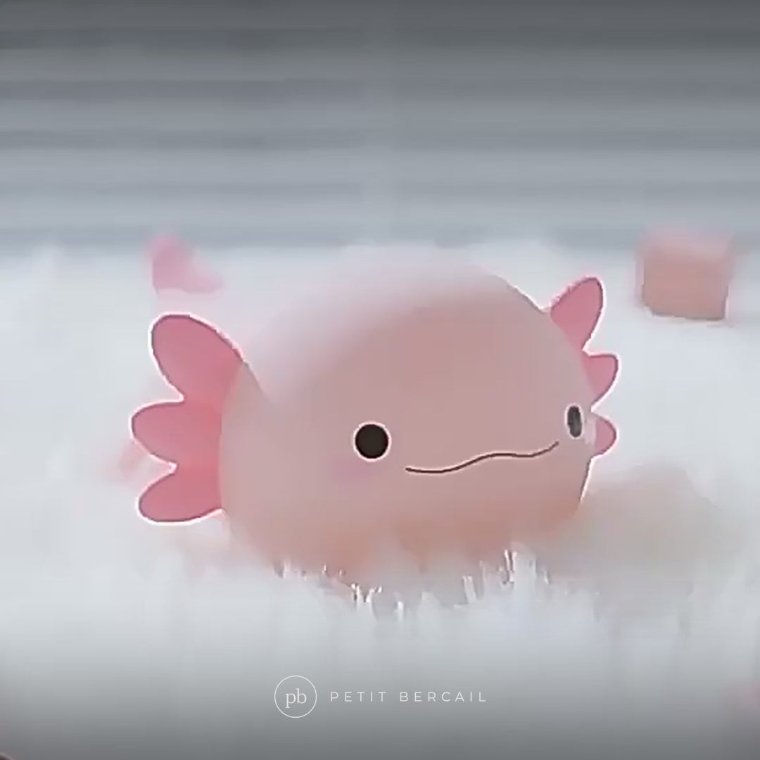 Veilleuse axolotl en action : deux niveaux de lumière au toucher