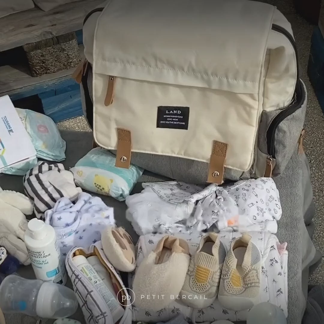 Sac à dos à langer 25 L avec matelas à langer en vidéo : rangements, matelas et port