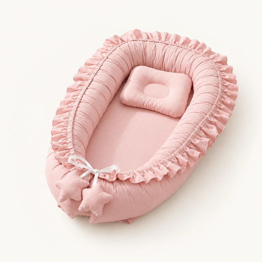 Réducteur de lit - Cocoon, coloris sakura, sur fond clair