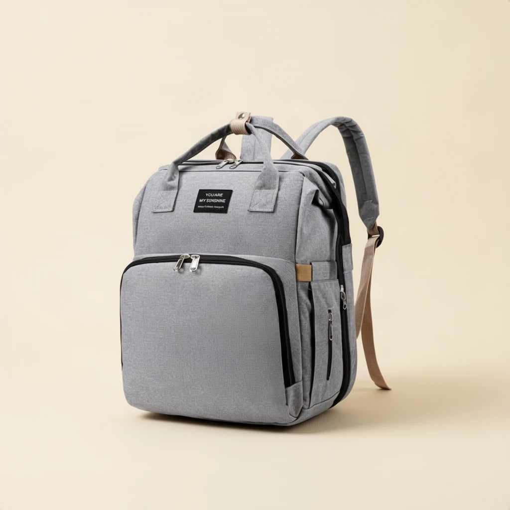 Sac à dos à langer avec couchette, 18 compartiments sur fond clair