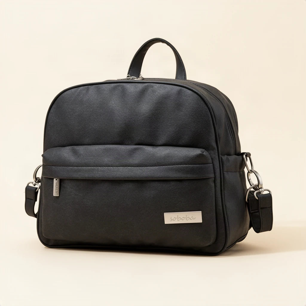 Sac à dos à langer compact effet cuir, couleur noir