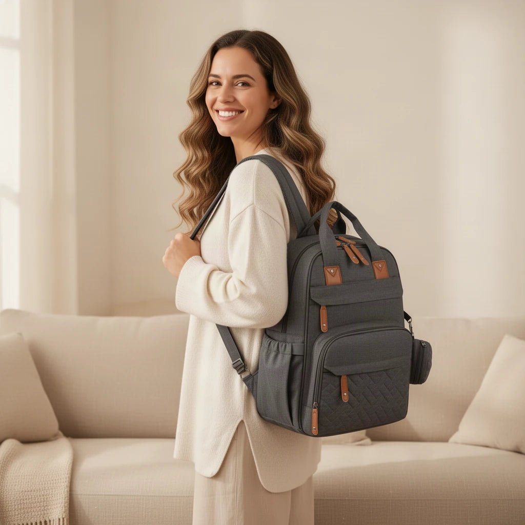 Sac à dos à langer isotherme et imperméable porté sur une épaule