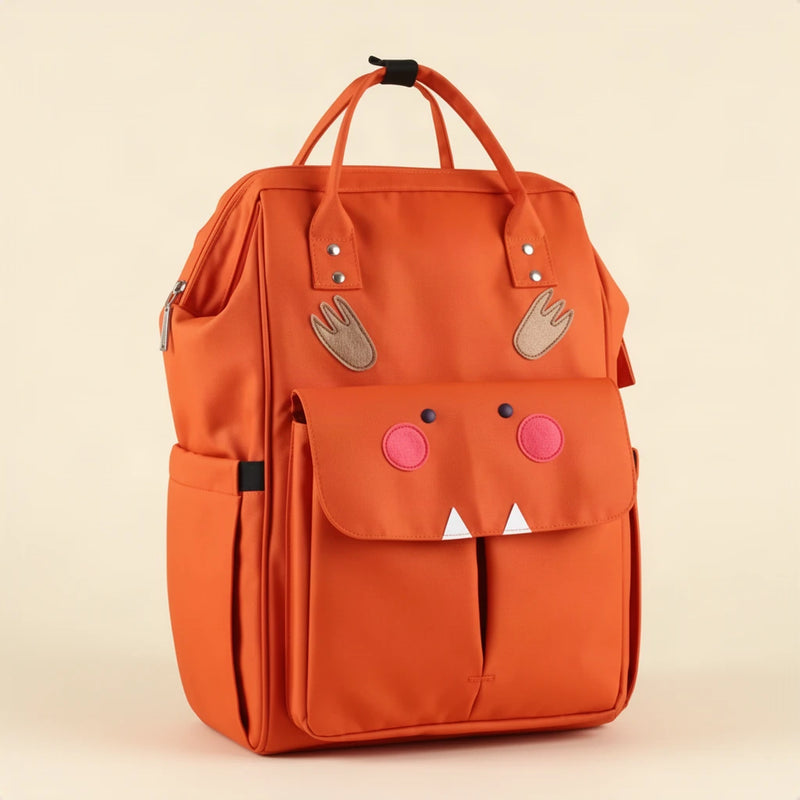 Sac à dos à langer motifs animaux avec attaches poussette sur fond clair