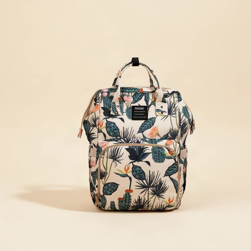 Sac à langer fleuri, sac à dos 15 poches sur fond clair