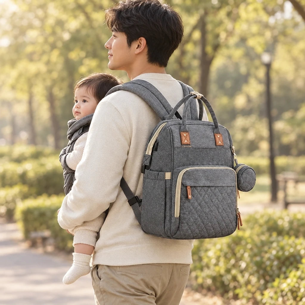 Sac à langer lit 3 en 1 avec matelas lavable porté sur le dos