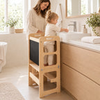 Enfant qui se lave les mains au lavabo, debout dans la tour d’observation enfant