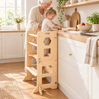 Grand-mère et enfant qui préparent des gâteaux, l’enfant debout dans la tour d’observation pliante