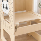 Détail de la base, des pieds et des barres de la tour montessori