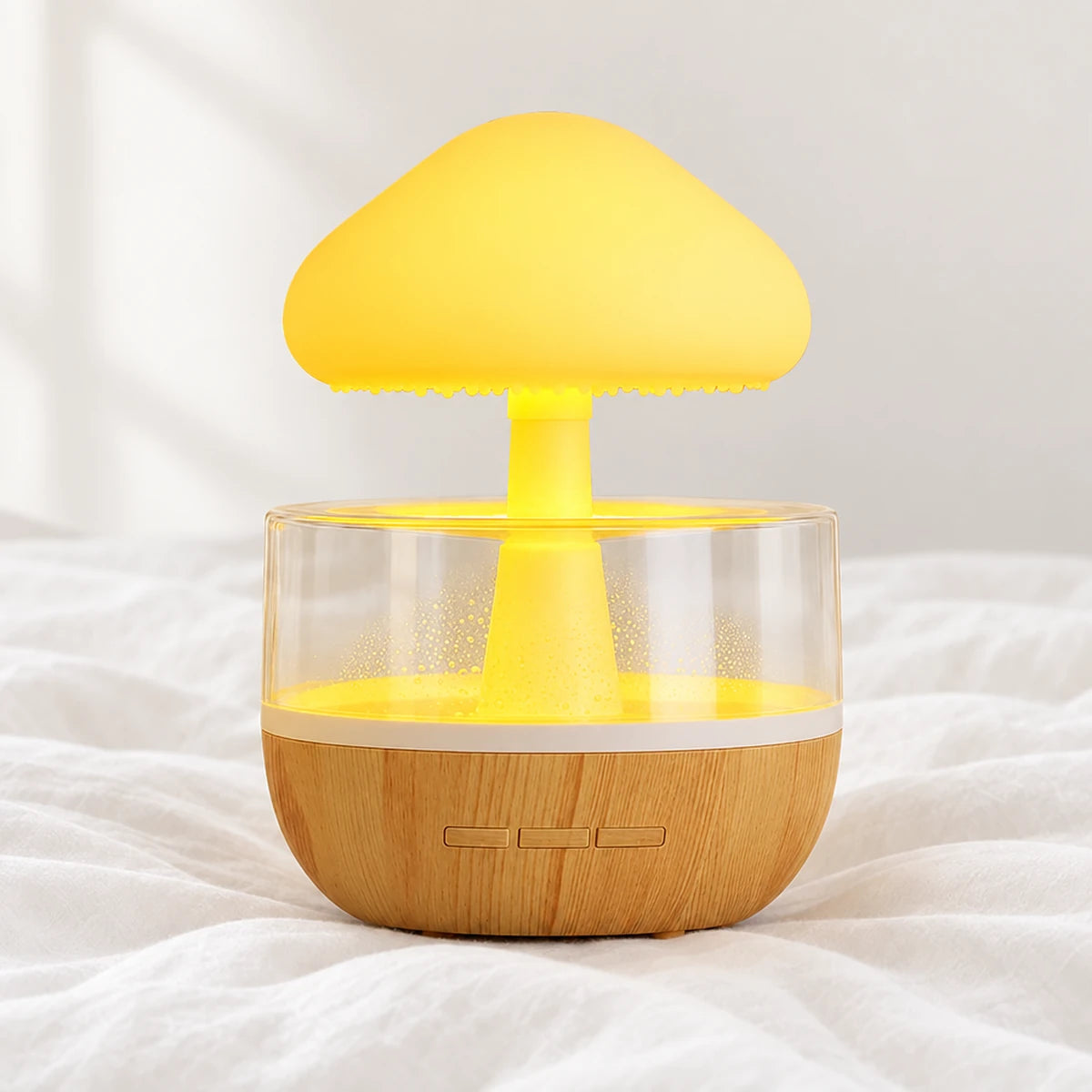 Veilleuse bruit de pluie champignon en gros plan sur un drap blanc